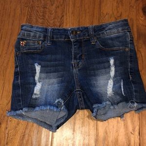 Girl ripped cutoffs